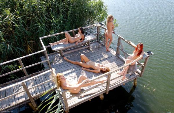 Five naked girls on a pier #12